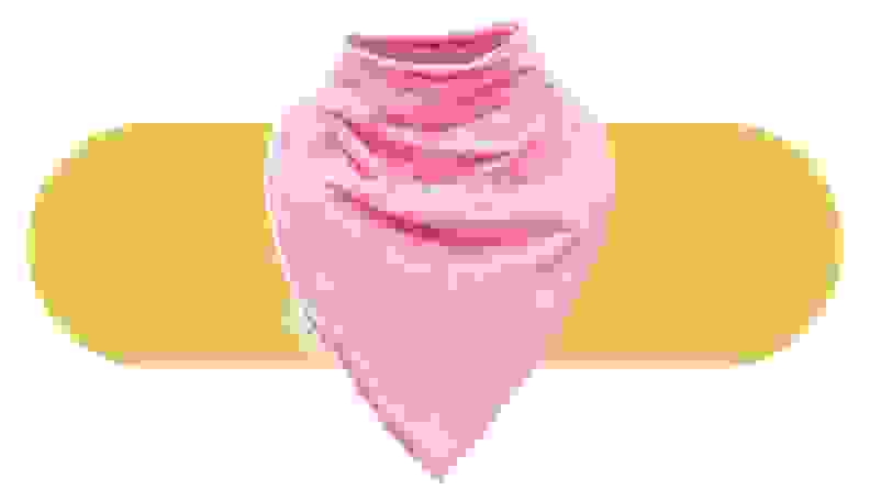 A pink KayCey bib on a colorful background.