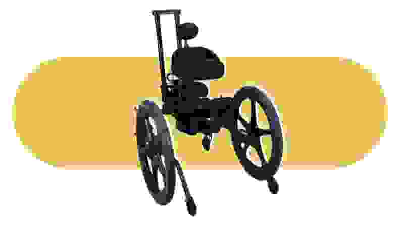 A black KidWalk gait trainer on a yellow background