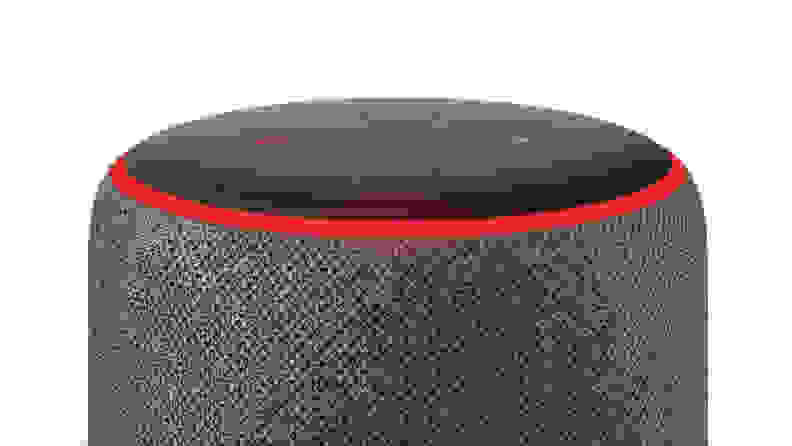 The top of an Amazon Echo speaker with the red light ring illuminated