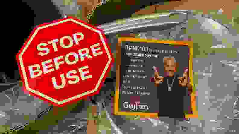 A paper stop sign and a thank you note from Guy Fieiri on top of a cookware set inside of plastic packaging.