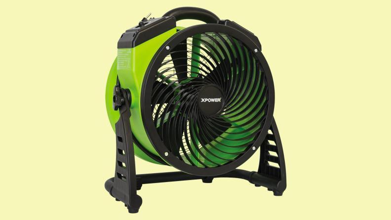 A floor fan appears on a yellow background.